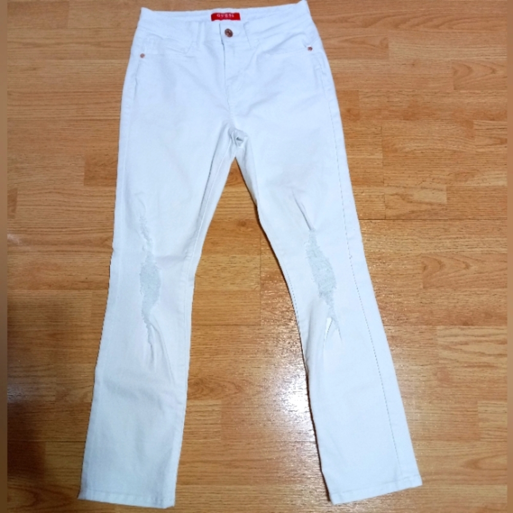 Guess white distressed jeans. Size 26. GUC. Two tiny marks on back leg.
